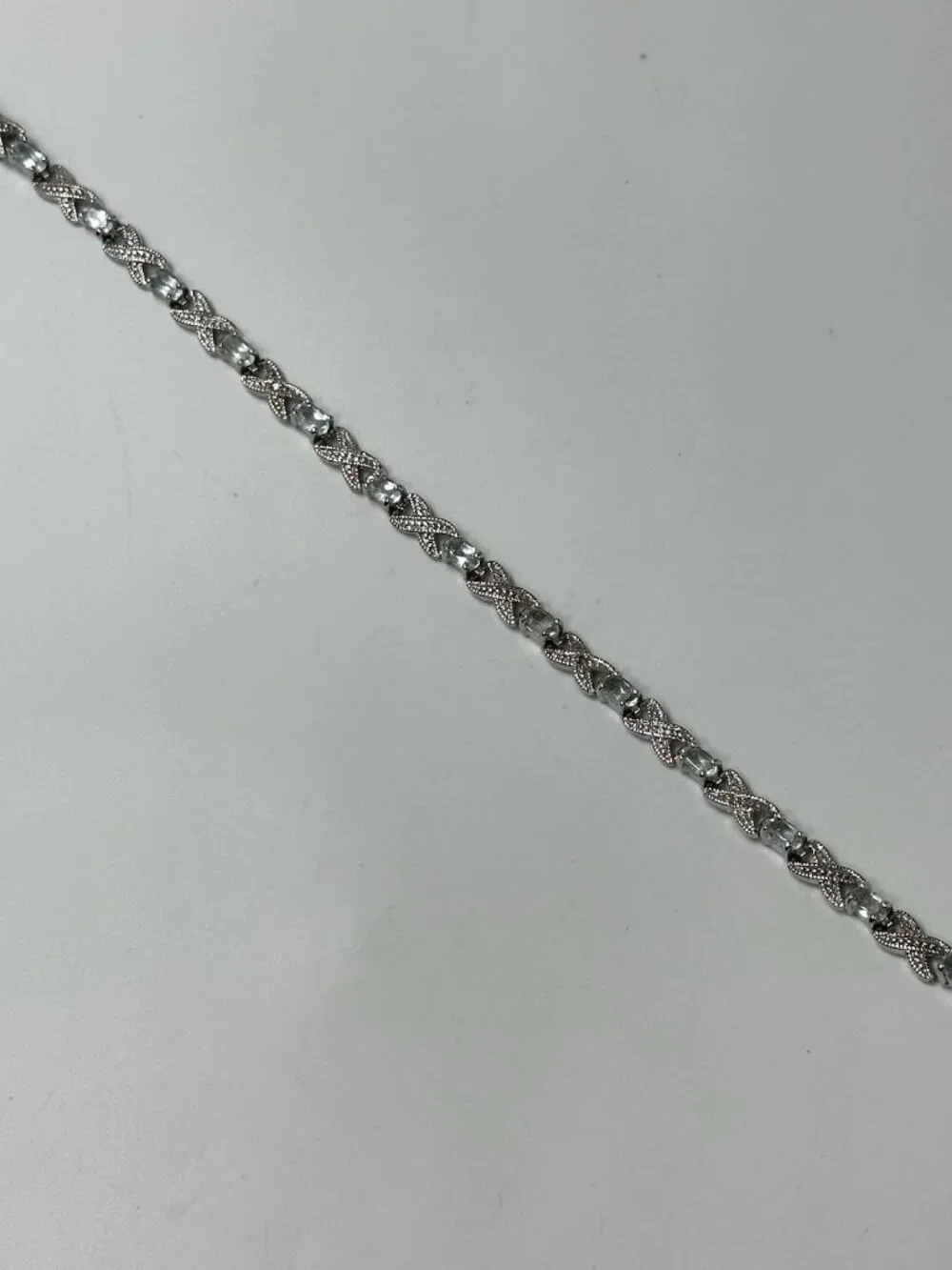 Infinity Link Tennis Bracelet Sterling Silver Blue Oval Stones 8 Grams 7.25”